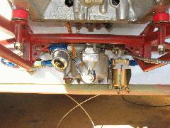 Left to right, Facet pump, fuel pressure sensor, carb, gascolator. IMG_0409.jpg